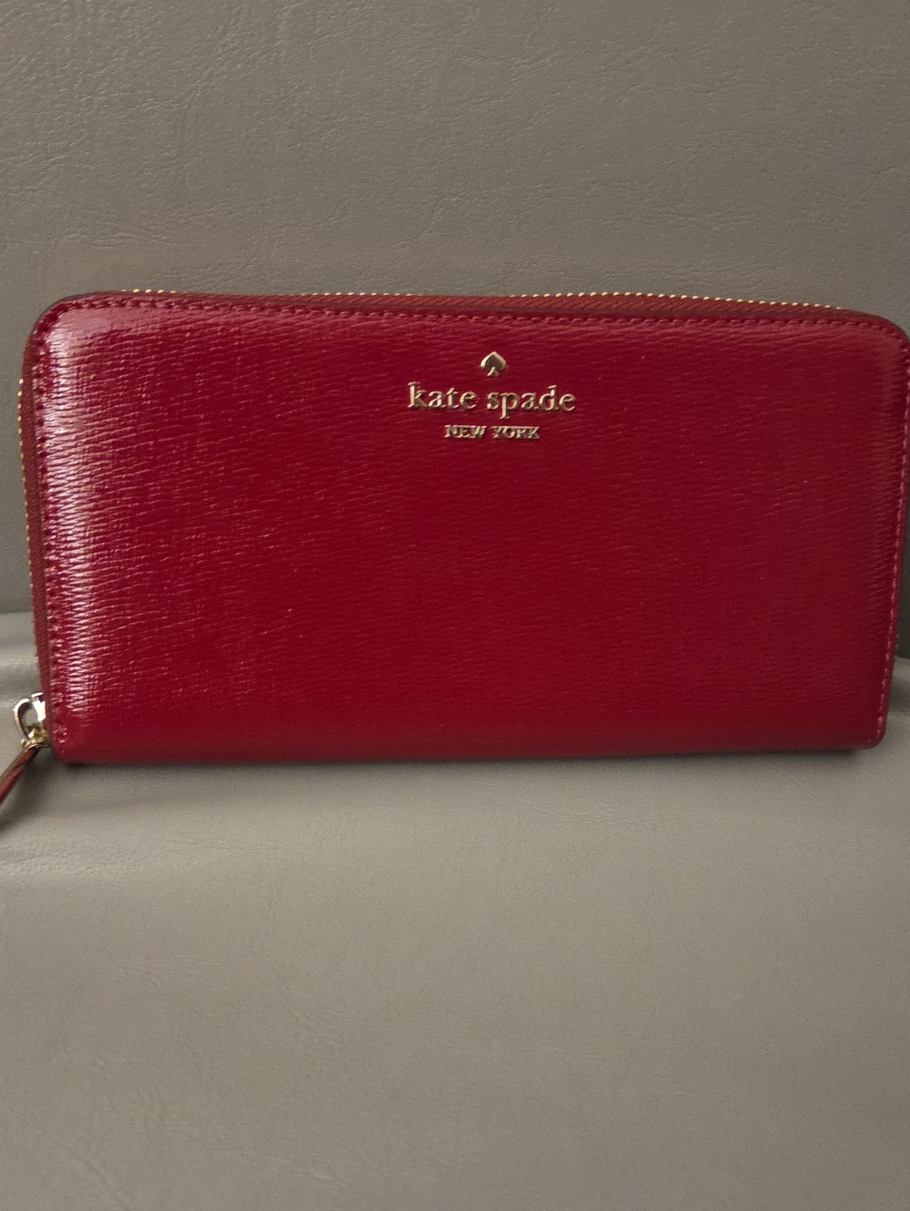 kate spade Red Patent Zip Wallet with Gold Logo
